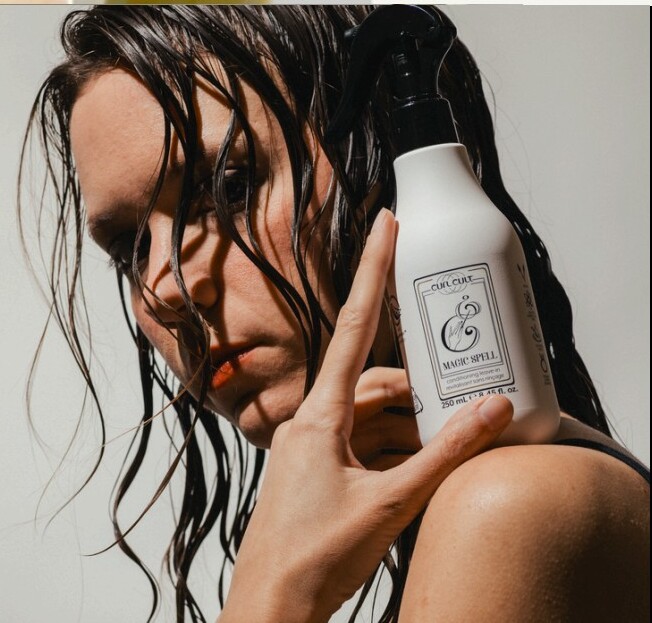 Editorial portrait highlighting curl texture